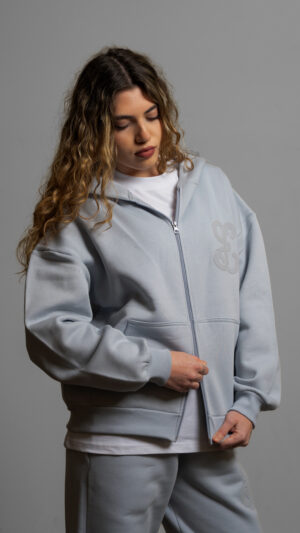 Ghost zip up worn by model