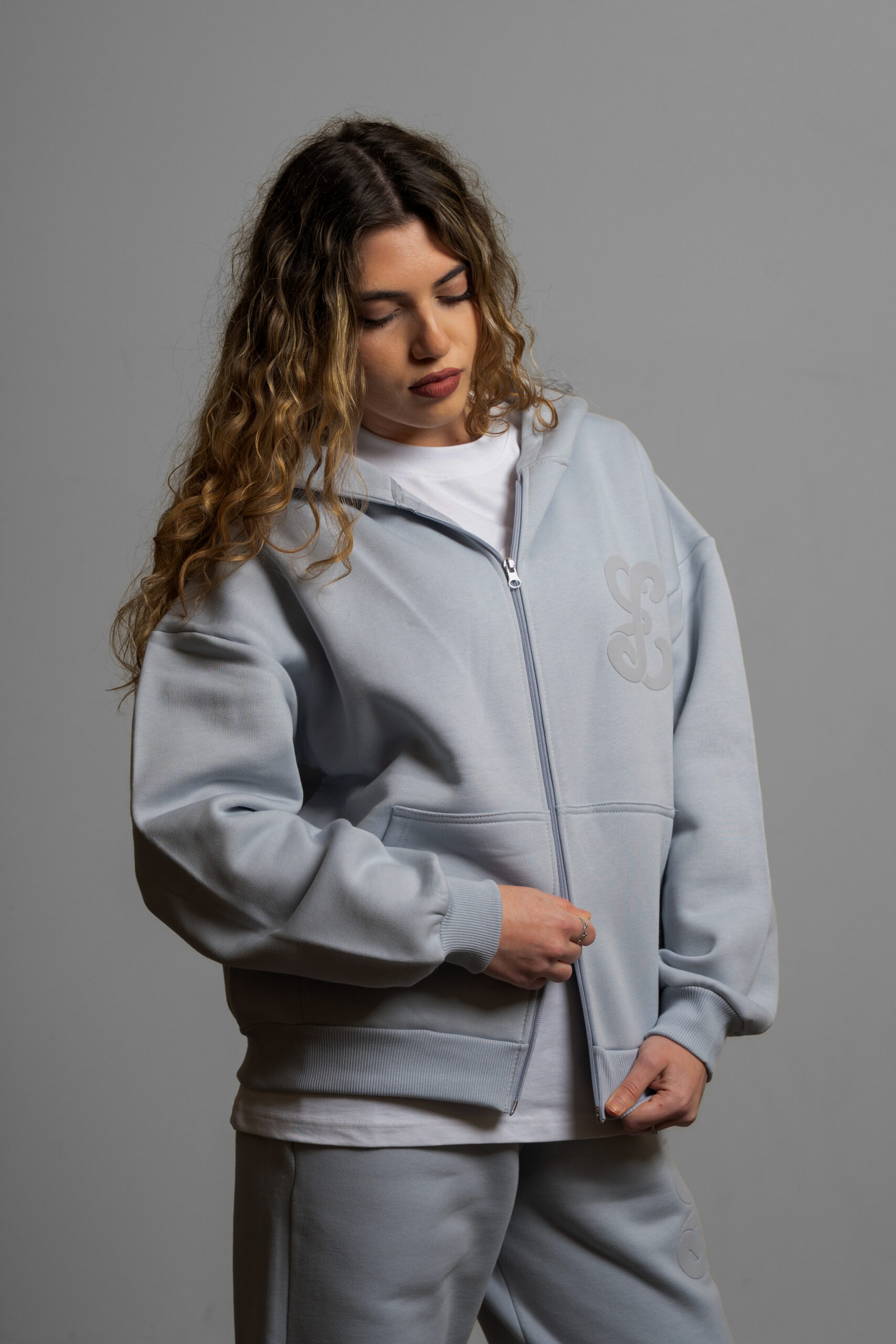 Ghost zip up worn by model