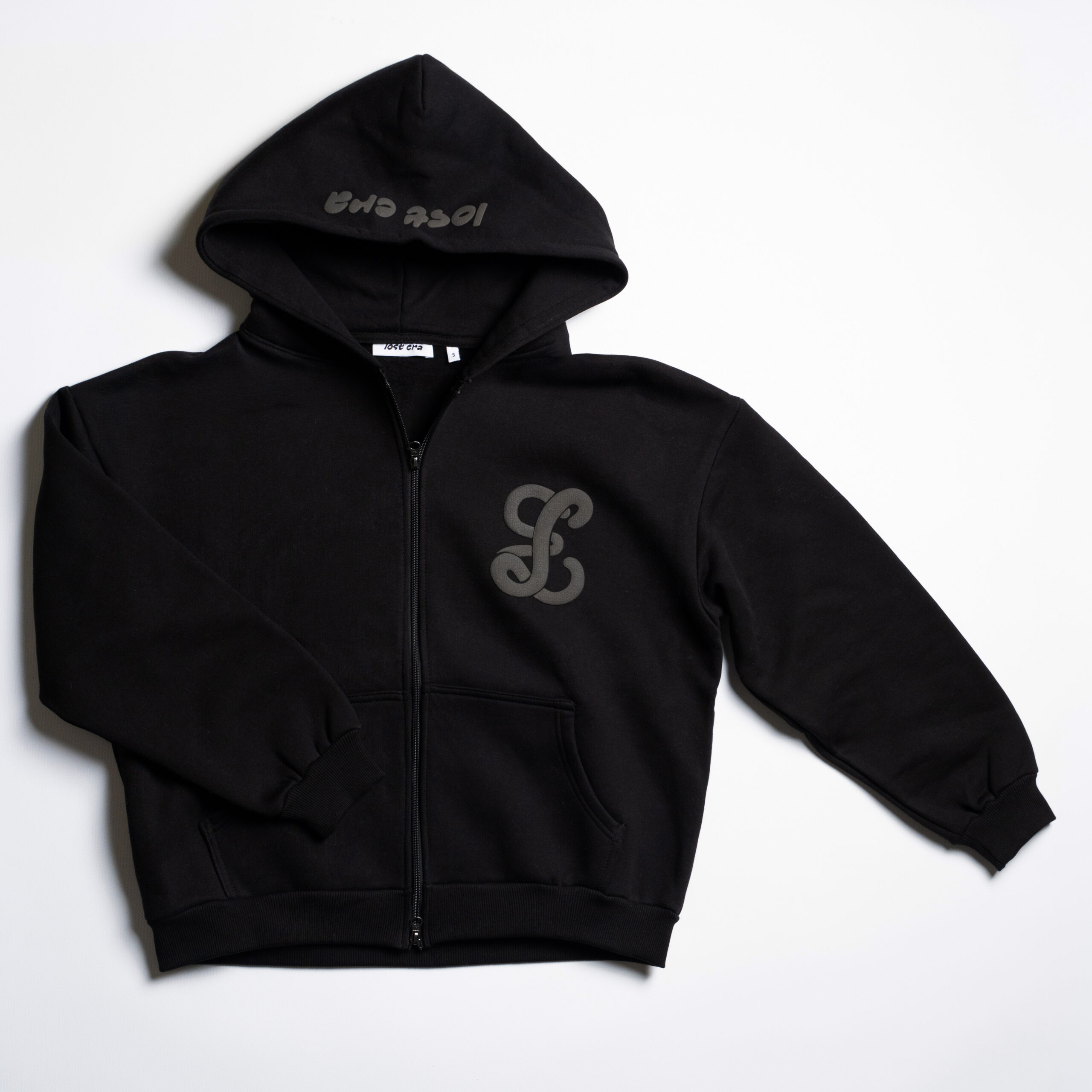 black zip up front side