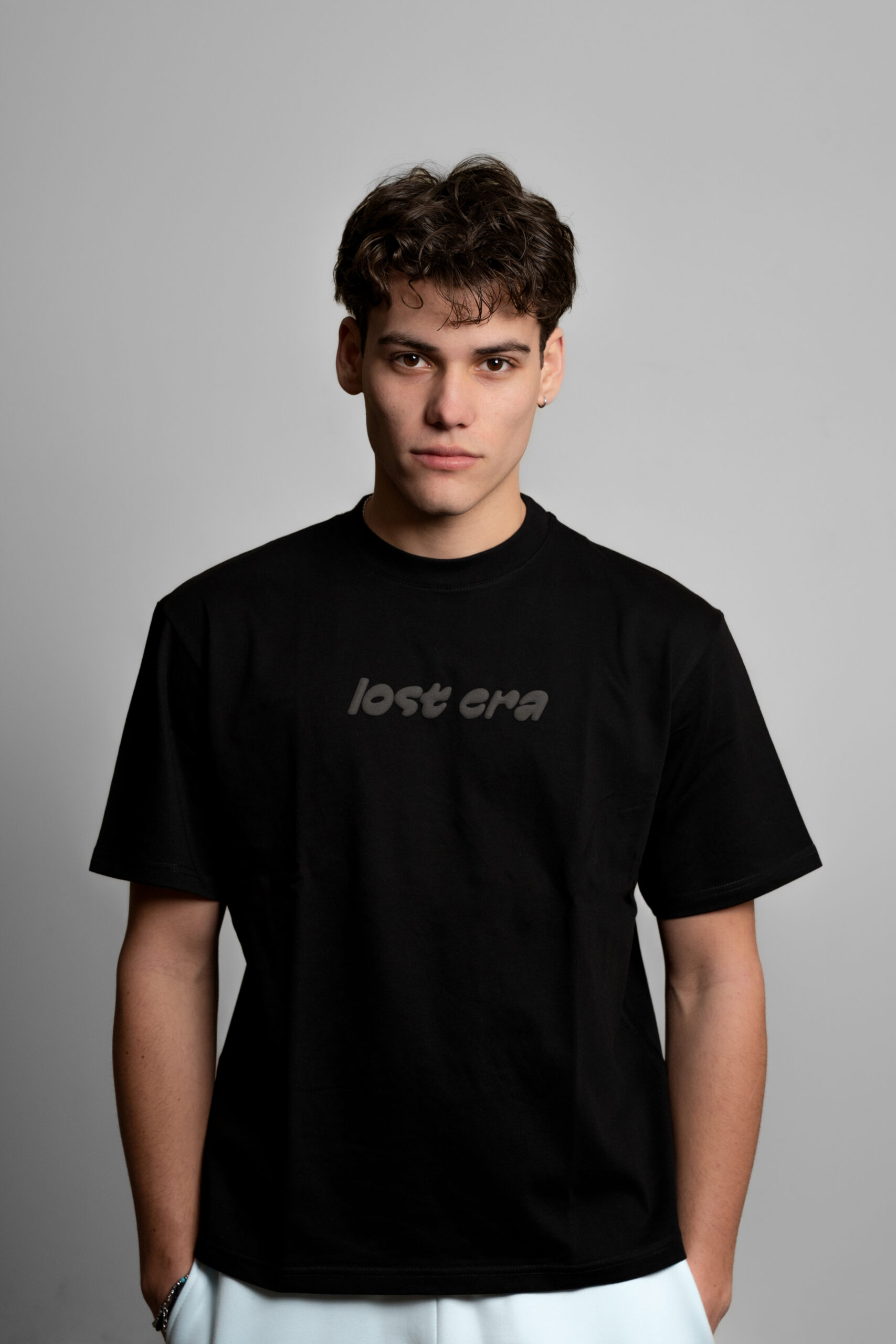lost era black t-shirt worn by model