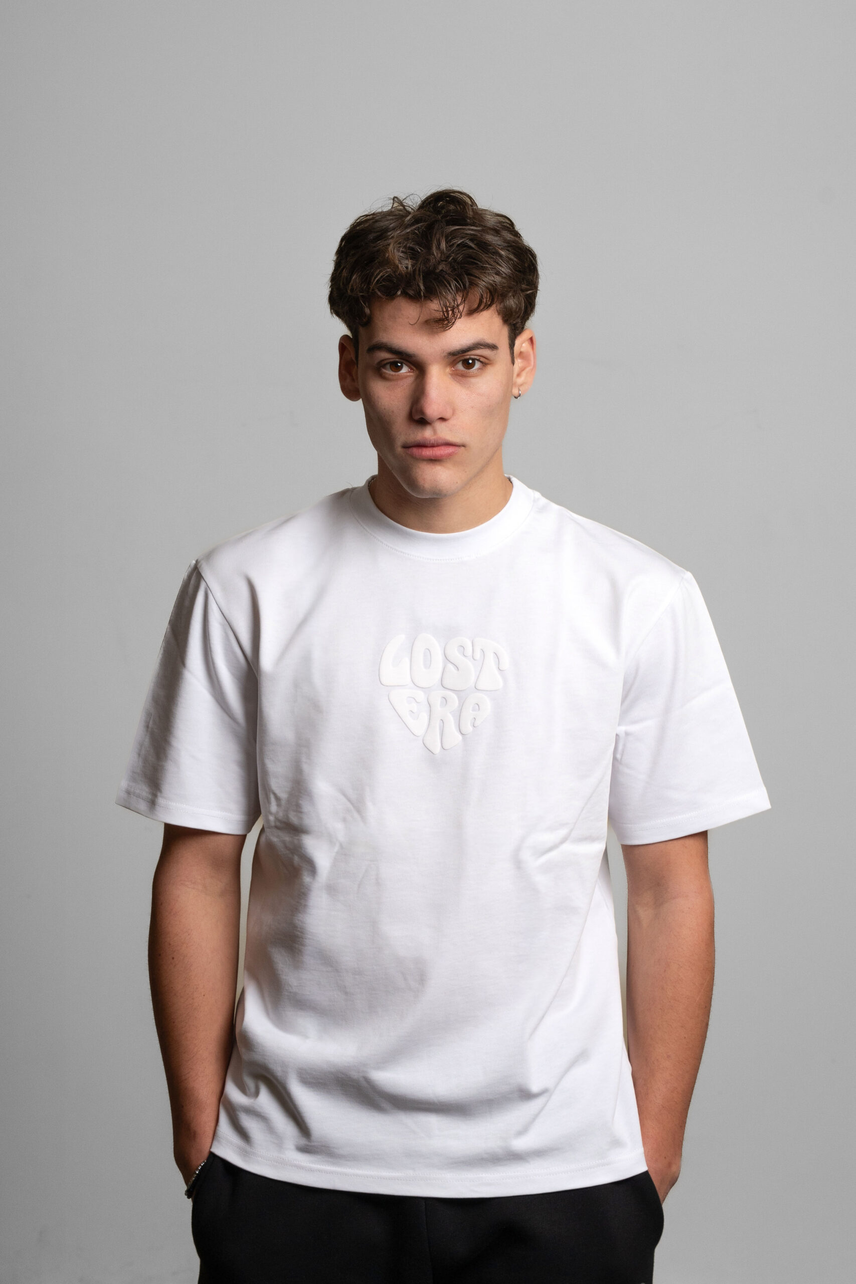 lost era whit t-shirt worn by model